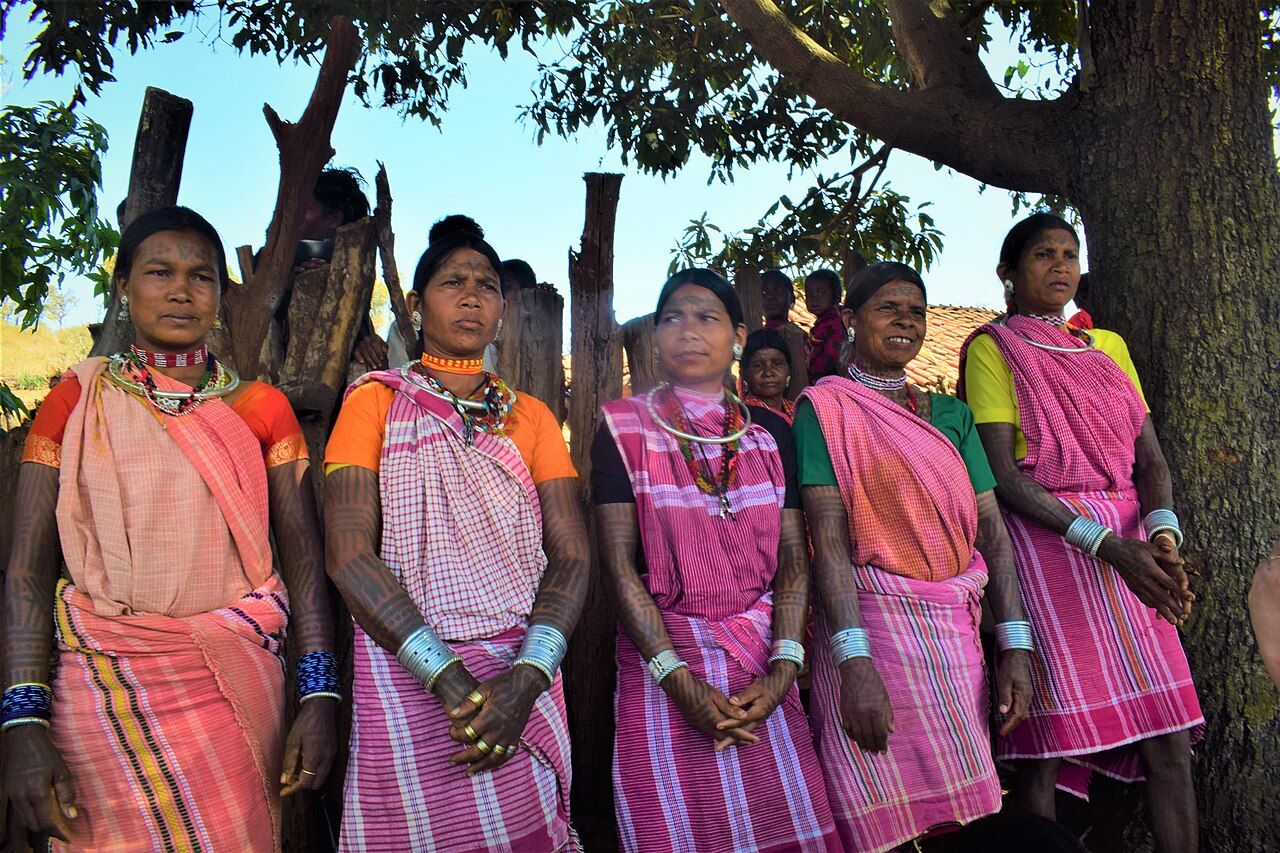 Baiga women of Madhya Pradesh, India, with extensive traditional tattoos across the body