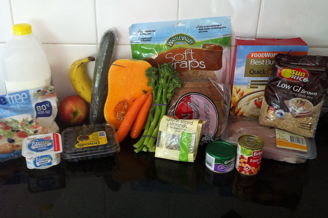 A spread of foods from several food groups arranged on a table